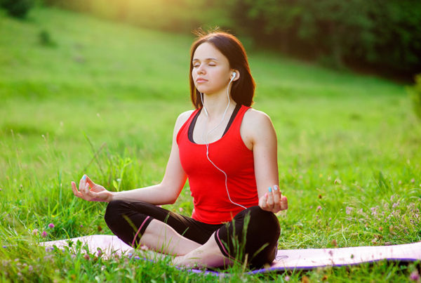 mindfulness meditation woman in park